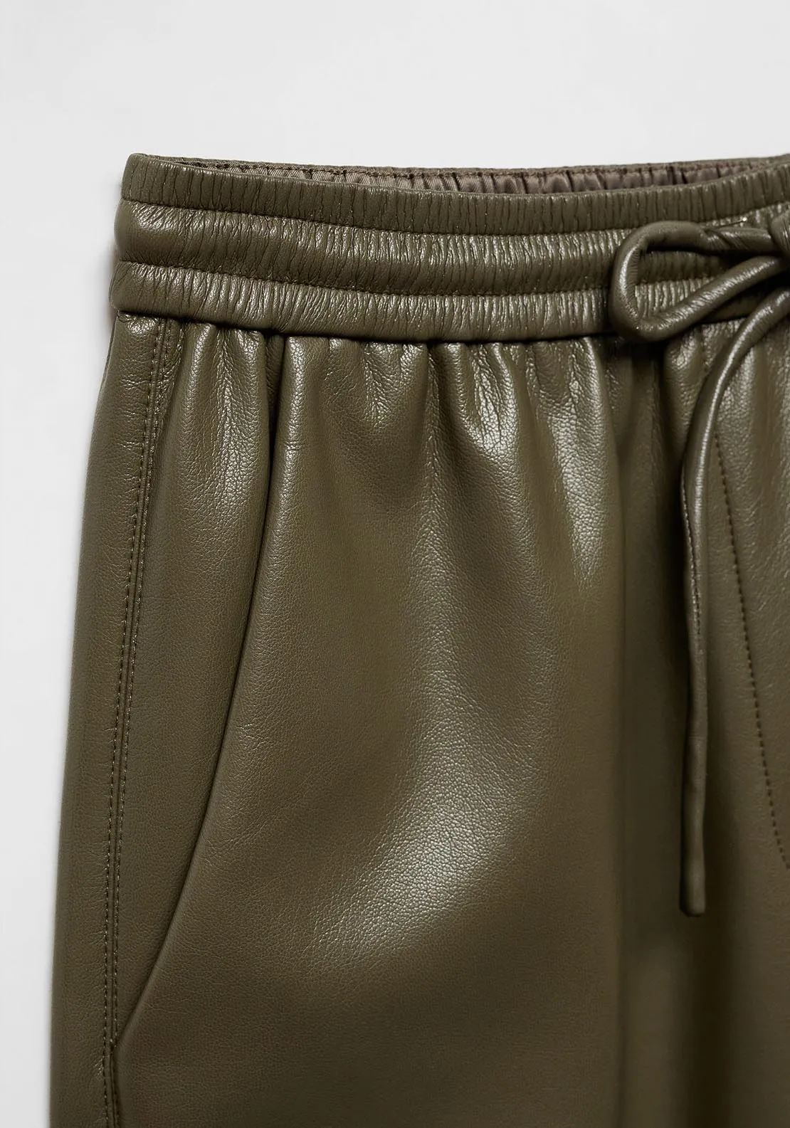 Leather-effect elastic waist trousers