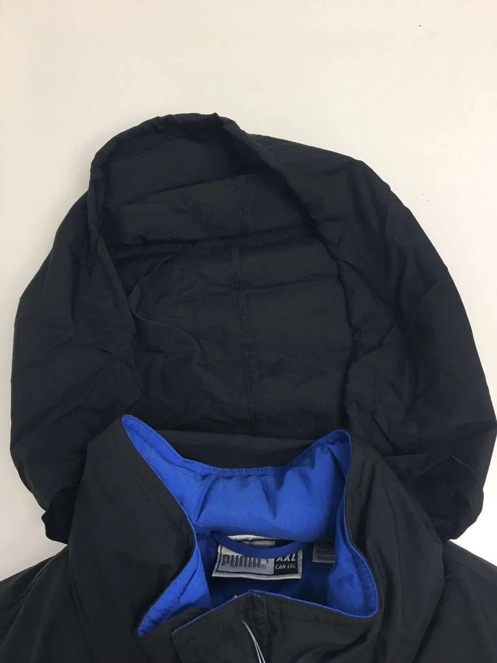 Vintage Puma black and blue padded coat, 90s – 2XL